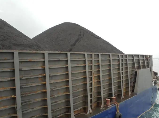 One of our barges has just finished loading coal and now is ready to set sail.