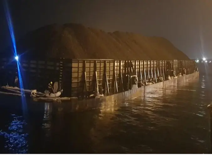 Our team works 24/7. Here is a picture that depicts moments before a barge full of coal finished its berthing process at night.