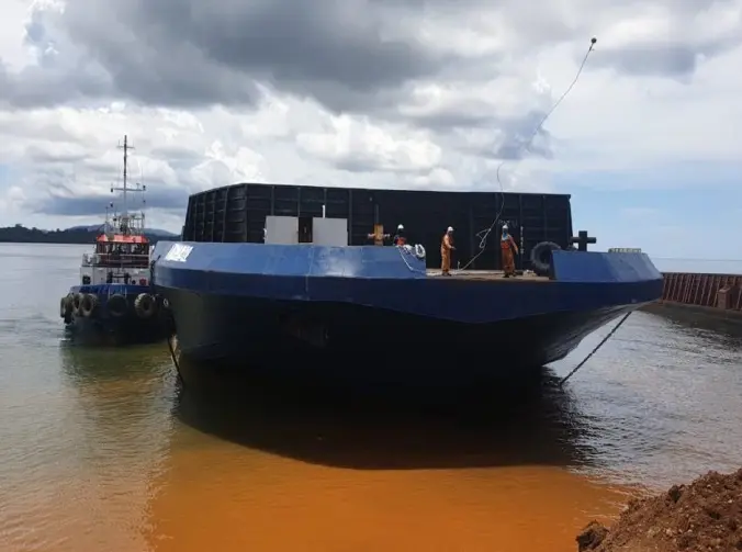 One of our crew casted a rope for the berthing process of our barge ship.
